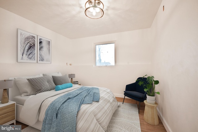 136 W Lytle Ave, State College, PA 16801 - bedroom with baseboards and wood finished floors
