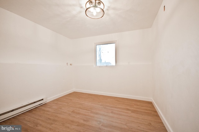 136 W Lytle Ave, State College, PA 16801 - spare room with a baseboard radiator, light wood-style floors, and baseboards