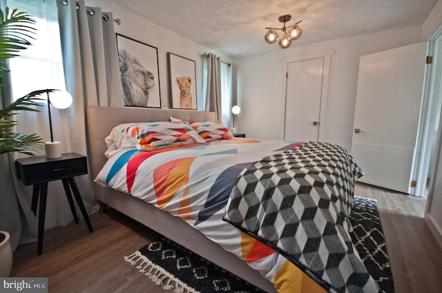 136 W Lytle Ave, State College, PA 16801 - bedroom featuring wood finished floors and a chandelier
