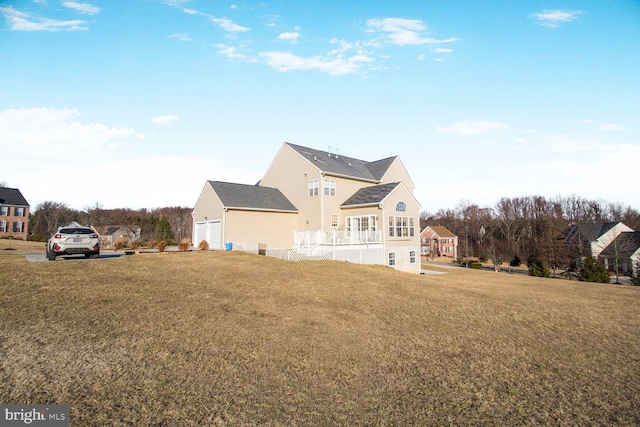 view of side of home with a lawn