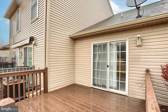 deck featuring central AC unit