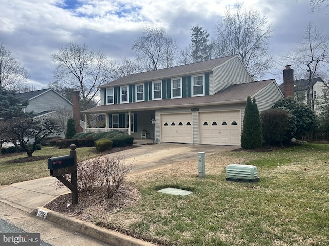 view of front of house with concrete driveway, covered porch, and a front yard