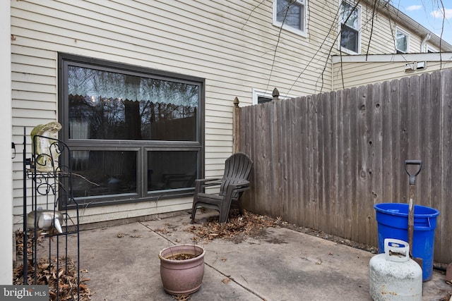 view of patio / terrace with fence