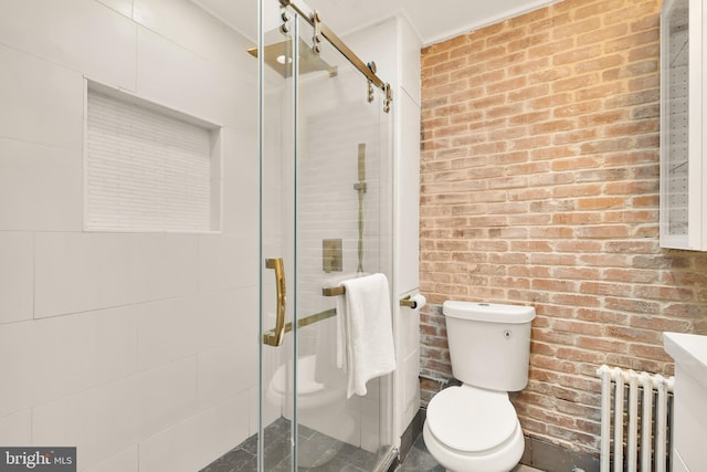 full bathroom with brick wall, a shower stall, toilet, and radiator