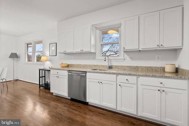 kitchen with dark wood-style flooring, a sink, white cabinetry, light stone countertops, and dishwasher