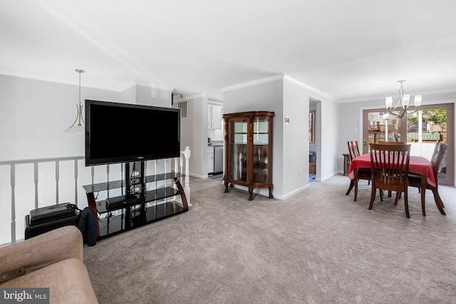 carpeted dining room with an inviting chandelier, crown molding, and baseboards