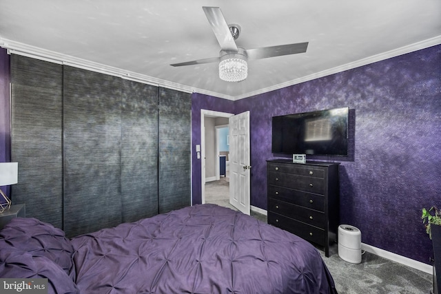 bedroom with a ceiling fan, baseboards, carpet floors, and ornamental molding