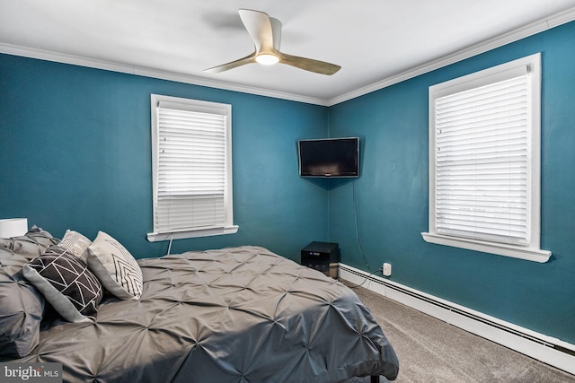 carpeted bedroom featuring baseboards, crown molding, ceiling fan, and a baseboard radiator