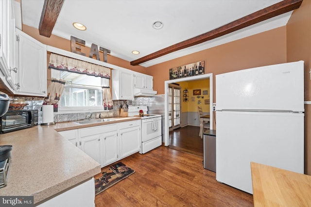 kitchen with beam ceiling, a sink, white appliances, white cabinets, and light countertops