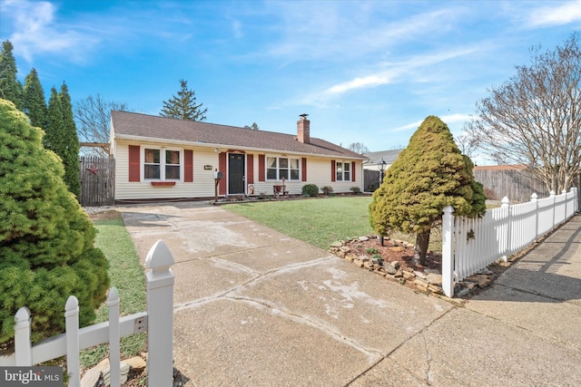 ranch-style house featuring a front lawn, a fenced front yard, and a chimney