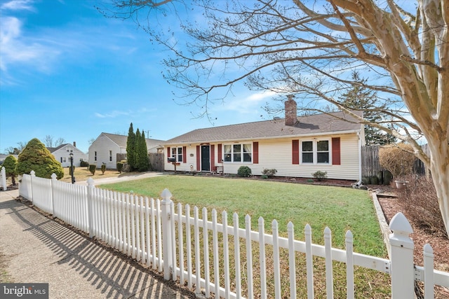 ranch-style home with a fenced front yard, driveway, a chimney, and a front yard