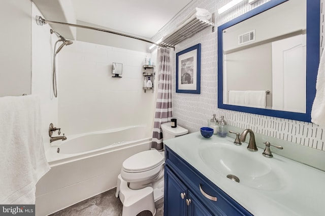 full bathroom featuring toilet, visible vents, shower / bath combo with shower curtain, and vanity