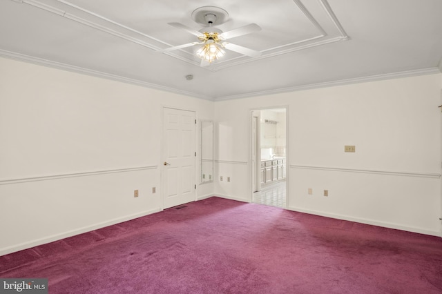 carpeted empty room featuring baseboards, crown molding, and ceiling fan