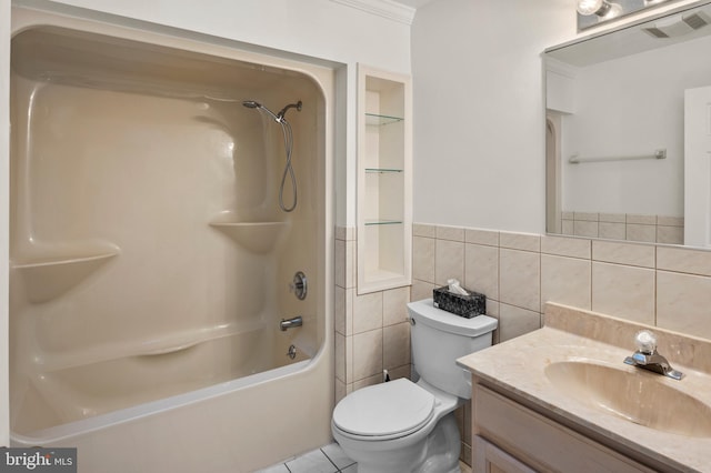 bathroom with vanity, tub / shower combination, tile patterned flooring, tile walls, and toilet