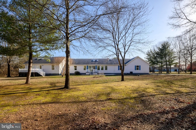 exterior space featuring a front yard