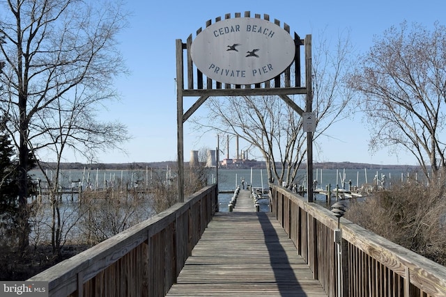 dock area featuring a water view