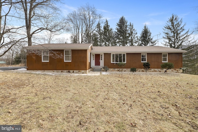 single story home featuring entry steps