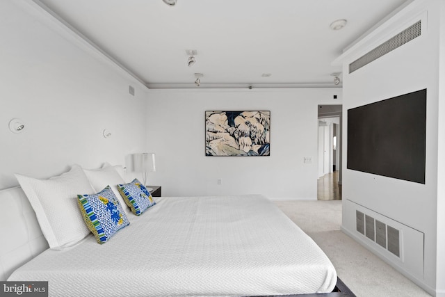 bedroom featuring visible vents and carpet flooring