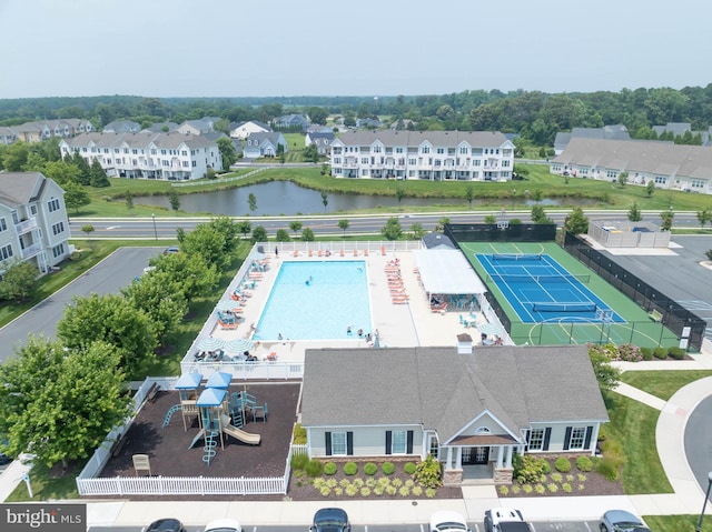 aerial view featuring a residential view and a water view