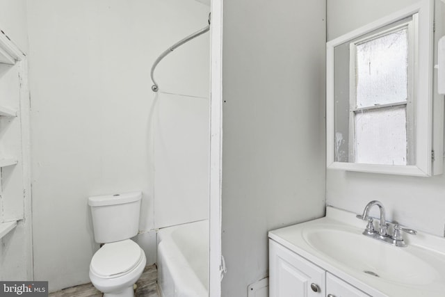 full bathroom with toilet, a bathtub, walk in shower, and vanity