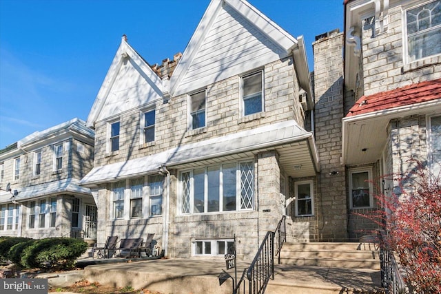 view of front of house with a patio area