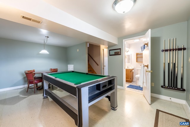 playroom with visible vents, light floors, and baseboards