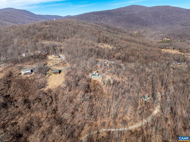 drone / aerial view featuring a mountain view