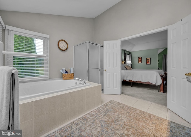 ensuite bathroom with a shower stall, ensuite bath, a bath, and tile patterned floors