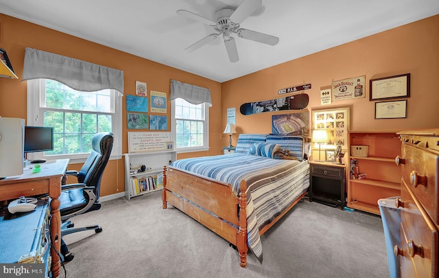 carpeted bedroom featuring ceiling fan