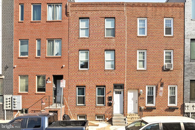 view of building exterior with entry steps