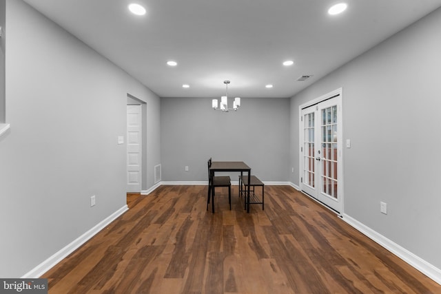 unfurnished dining area featuring dark wood-style floors, french doors, baseboards, and recessed lighting