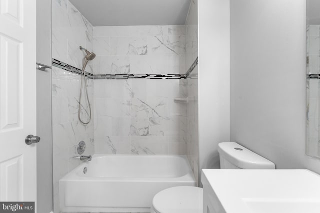 full bathroom featuring shower / bathing tub combination, vanity, and toilet