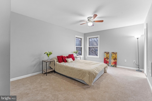 bedroom featuring carpet flooring, a ceiling fan, and baseboards