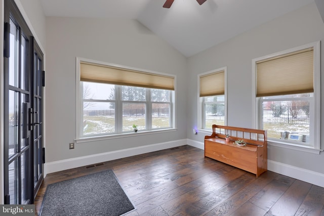 entryway featuring visible vents, baseboards, lofted ceiling, and hardwood / wood-style flooring