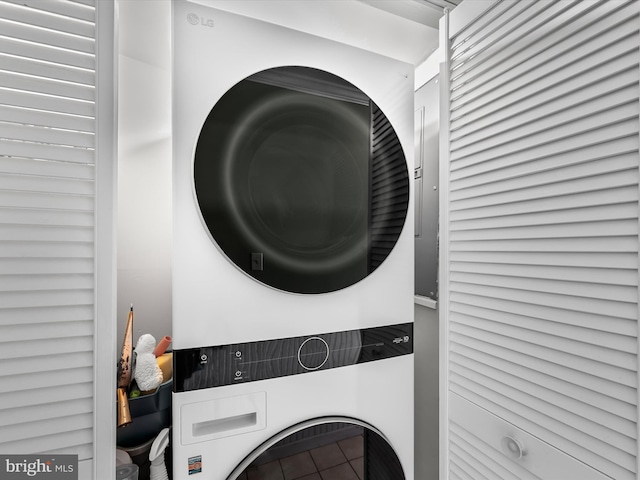 8500 Coastal Hwy Unit 107, Ocean City, MD 21842 - laundry area with stacked washer and clothes dryer and laundry area