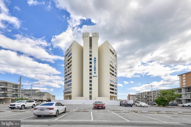 8500 Coastal Hwy Unit 107, Ocean City, MD 21842 - view of building exterior with uncovered parking