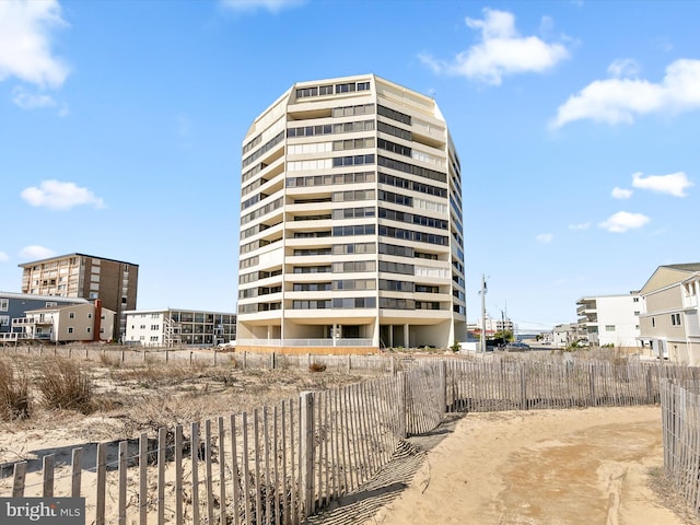 8500 Coastal Hwy Unit 107, Ocean City, MD 21842 - view of building exterior featuring fence