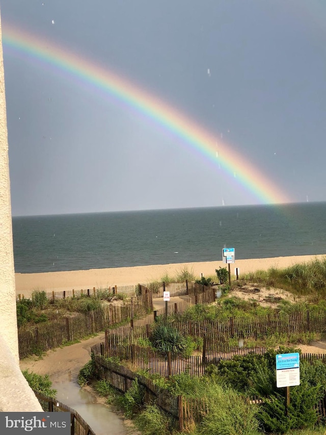 8500 Coastal Hwy Unit 107, Ocean City, MD 21842 - view of water feature featuring fence and a beach view