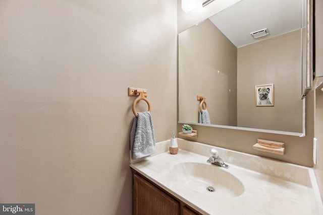 bathroom with visible vents and vanity