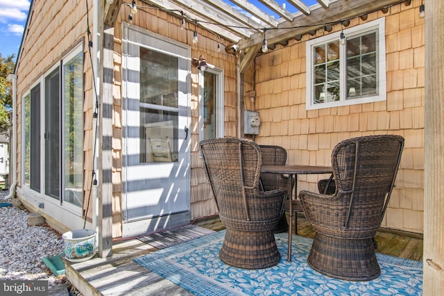 wooden deck with a pergola