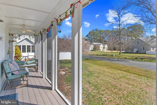 sunroom with a residential view