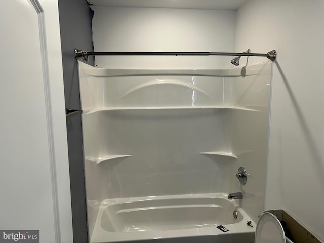 full bathroom with shower / tub combination and toilet