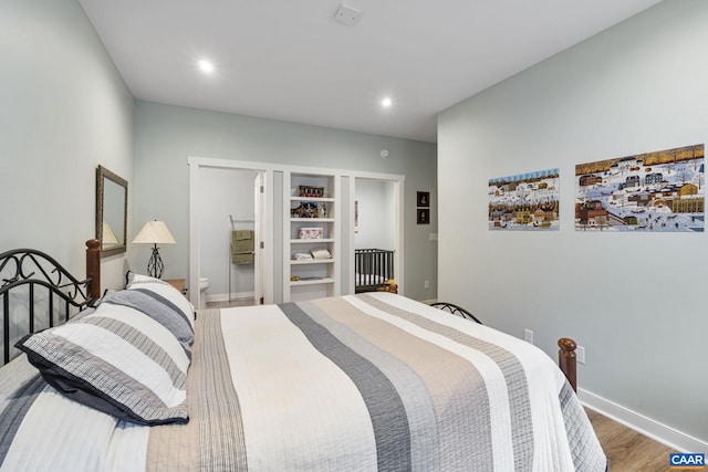 bedroom featuring recessed lighting, baseboards, and wood finished floors