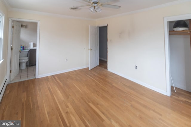 unfurnished bedroom with a closet, ornamental molding, light wood-style floors, connected bathroom, and baseboards