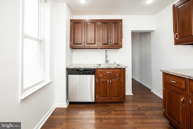 kitchen with dark wood-style floors, recessed lighting, dishwasher, and a sink