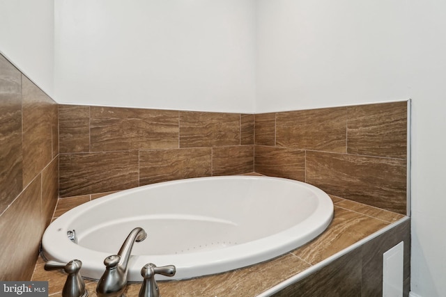 full bathroom with a garden tub