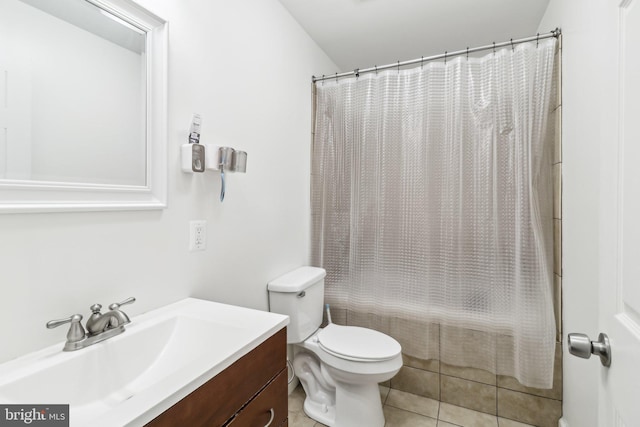 full bathroom with shower / tub combo, vanity, toilet, and tile patterned floors