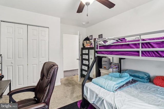 bedroom featuring a closet, carpet flooring, and a ceiling fan