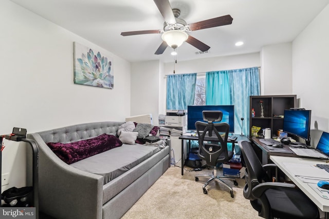 carpeted office space featuring visible vents, a ceiling fan, and recessed lighting