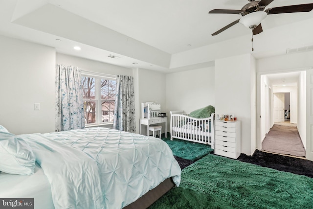 bedroom featuring carpet, visible vents, a ceiling fan, and recessed lighting